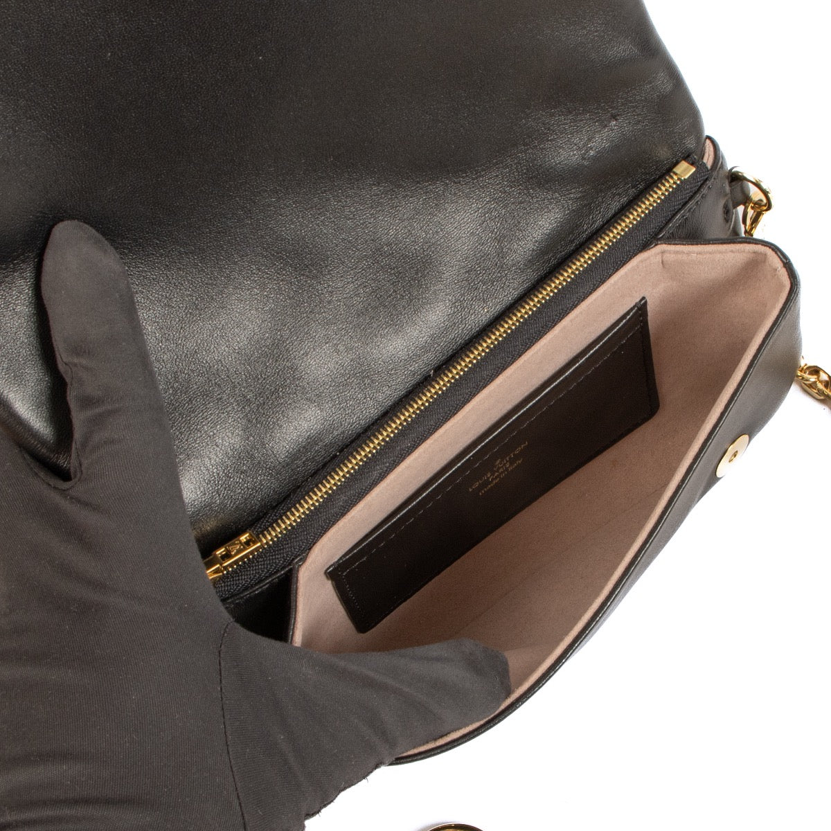 Shop safe online at Labellov in Antwerp, Brussels and Knokke this 100% authentic second hand Louis Vuitton Black Monogram Embossed Lambskin Pochette Coussin Crossbody