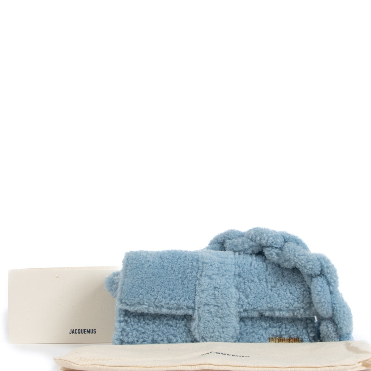 Shop safe online at Labellov in Antwerp, Brussels and Knokke this 100% authentic second hand Jacquemus Light Blue Shearling Le Bambidou Bag