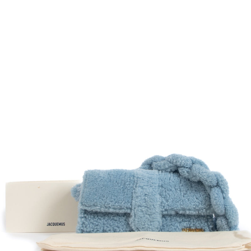 Shop safe online at Labellov in Antwerp, Brussels and Knokke this 100% authentic second hand Jacquemus Light Blue Shearling Le Bambidou Bag