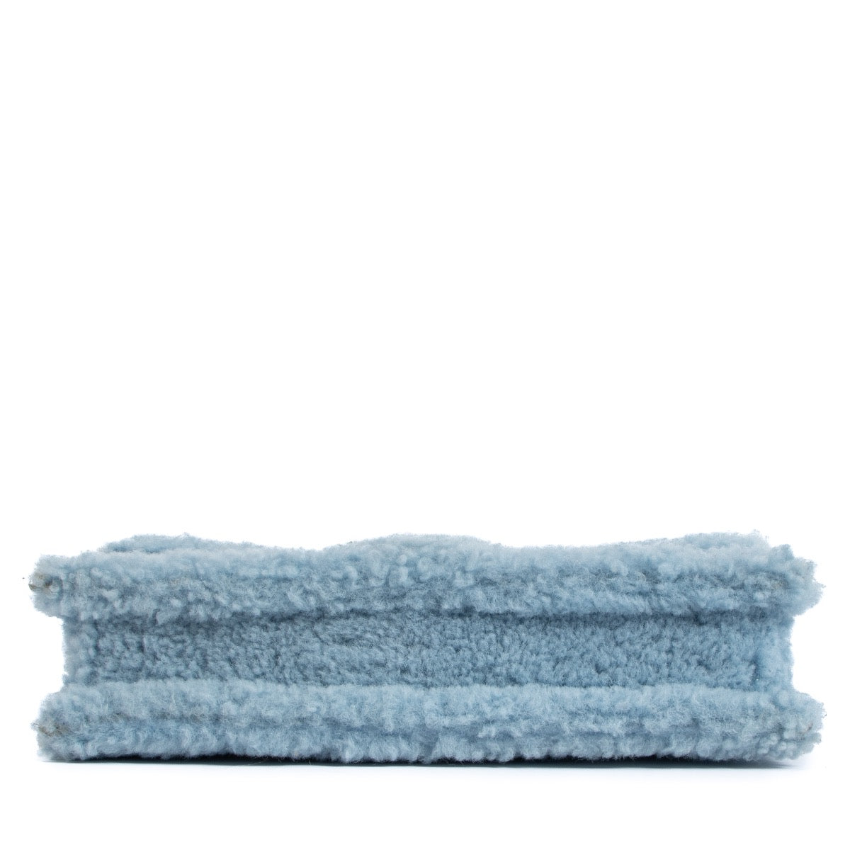 Shop safe online at Labellov in Antwerp, Brussels and Knokke this 100% authentic second hand Jacquemus Light Blue Shearling Le Bambidou Bag