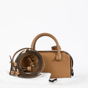 Delvaux Cool Box Nano bag in Vegetal Taurillon Soft leather with gold-tone hardware, available at Labellov.com
