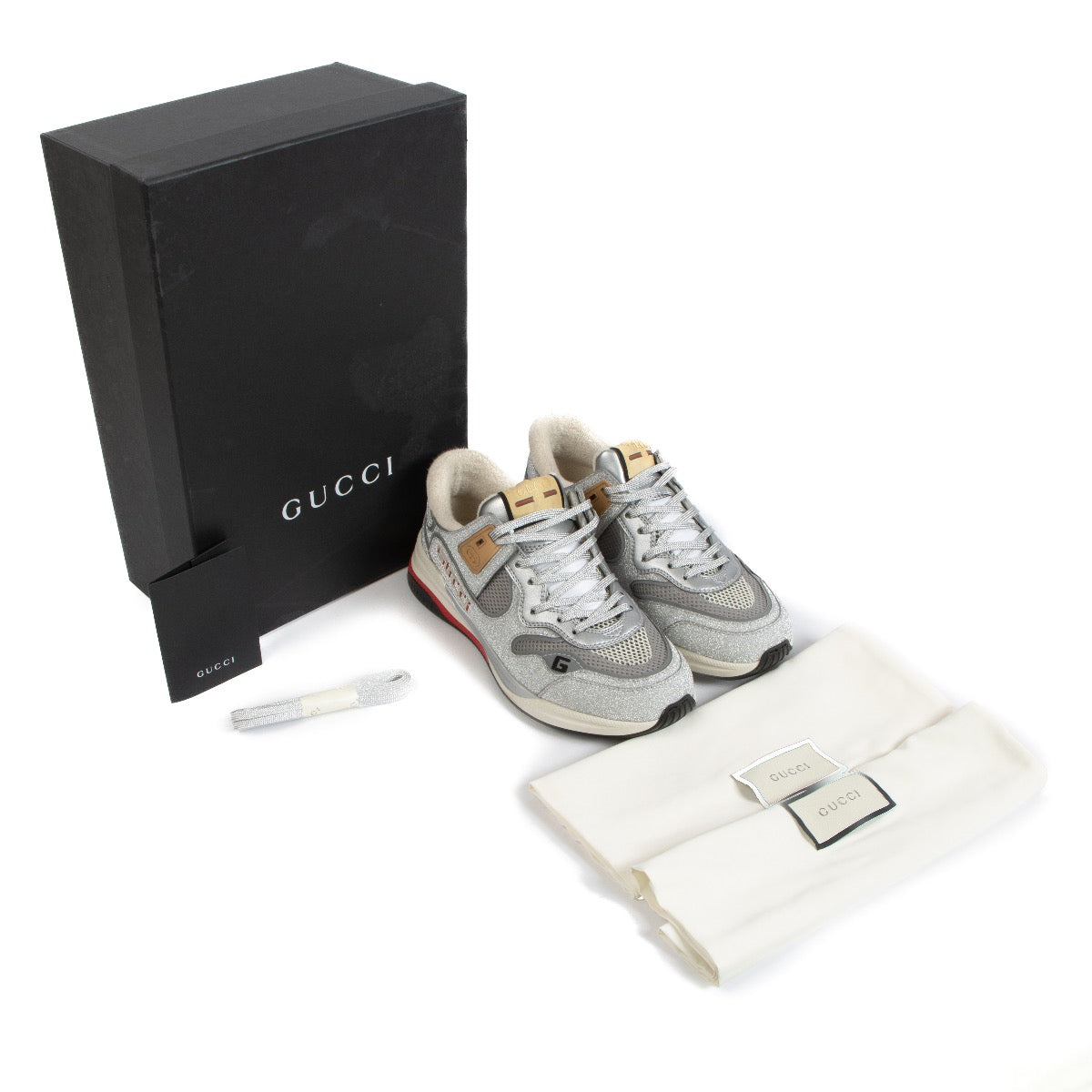 Shop safe online at Labellov in Antwerp, Brussels and Knokke these 100% authentic second hand Gucci Silver Glitter Ultrapace Sneakers - size 39,5