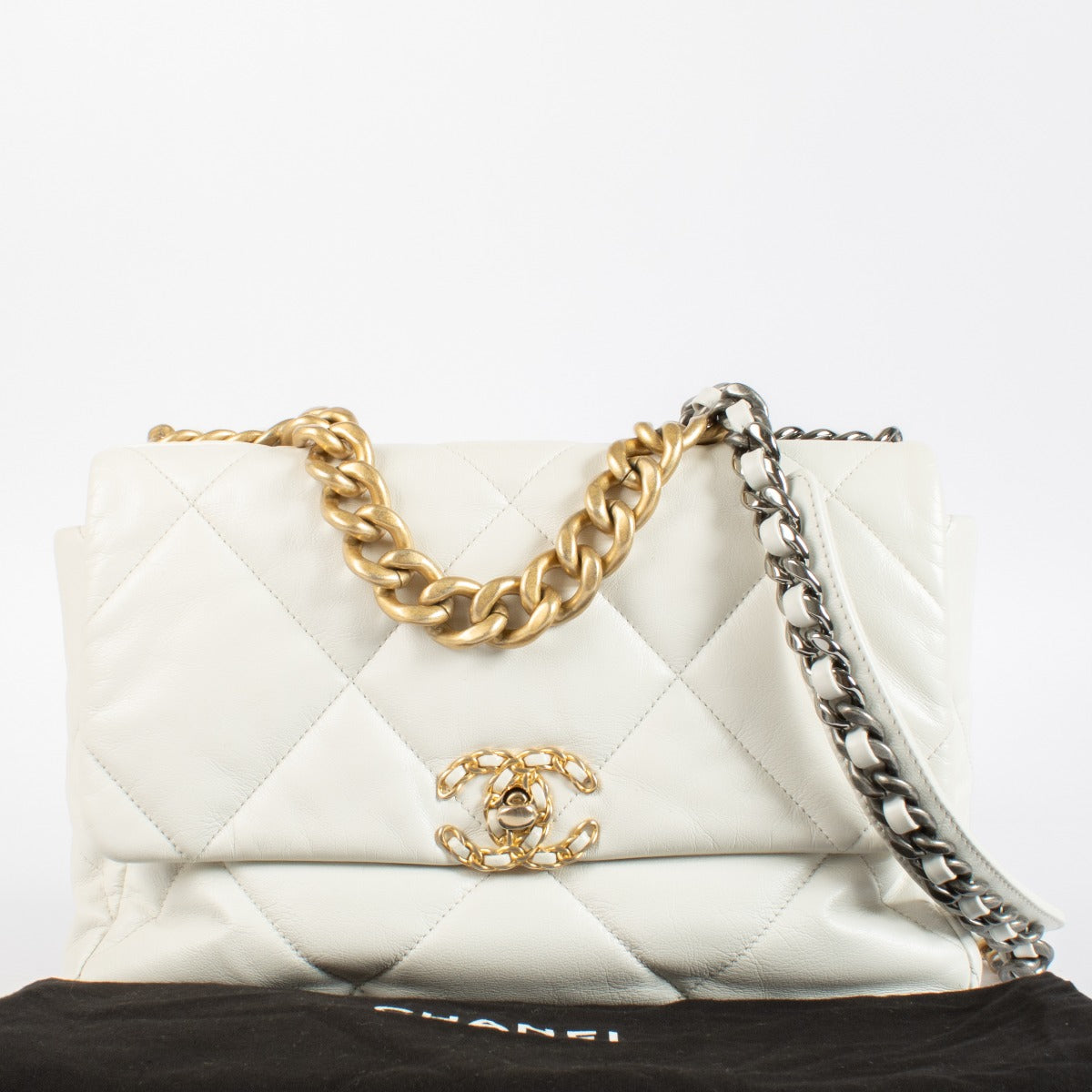 Chanel 19 Flap Bag in white lambskin with mixed-metal hardware. A modern Chanel icon in very good condition, perfect for day-to-night styling.