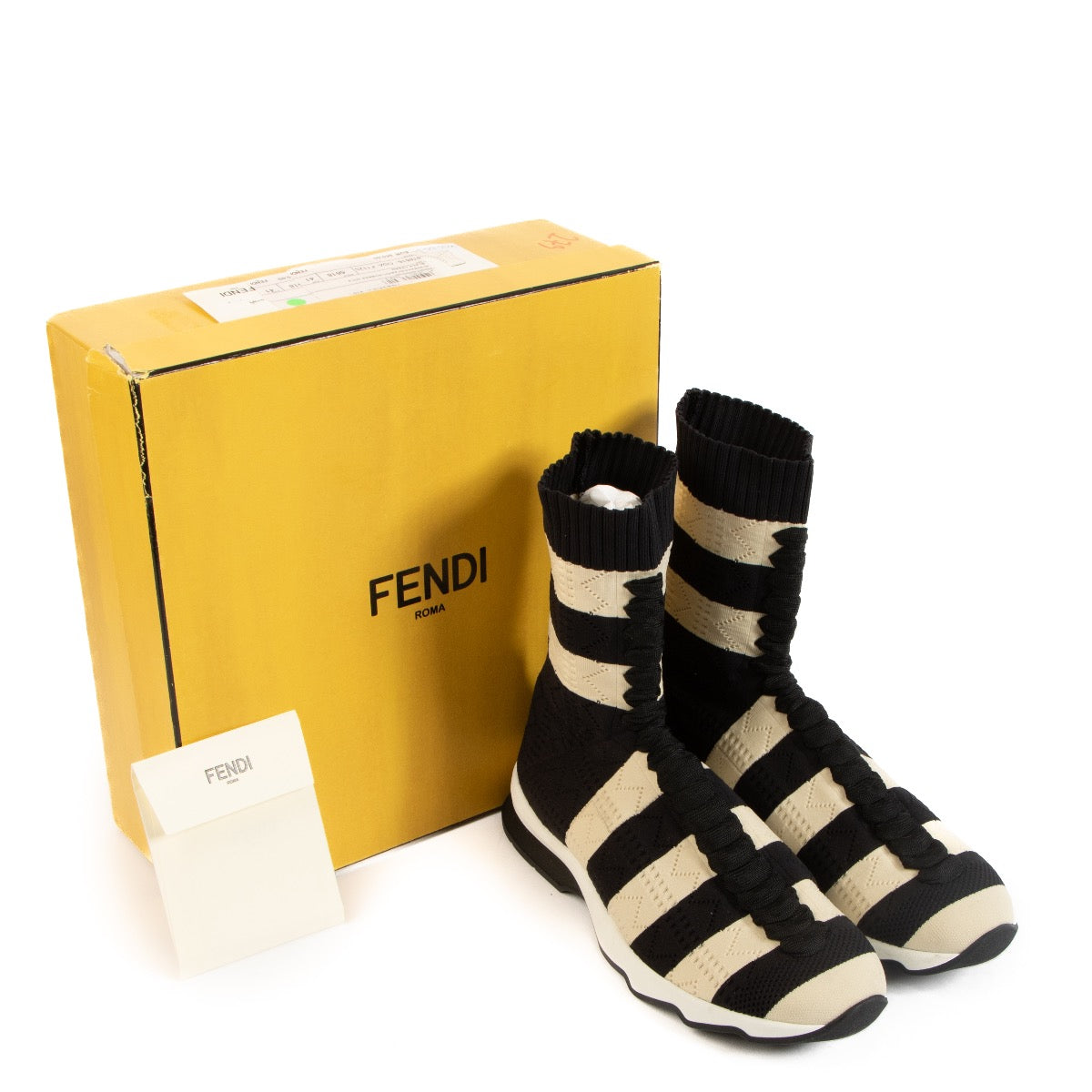 Shop safe online at Labellov in Antwerp, Brussels and Knokke these 100% authentic second hand Fendi Striped Black and Cream Sock Sneakers - size 41