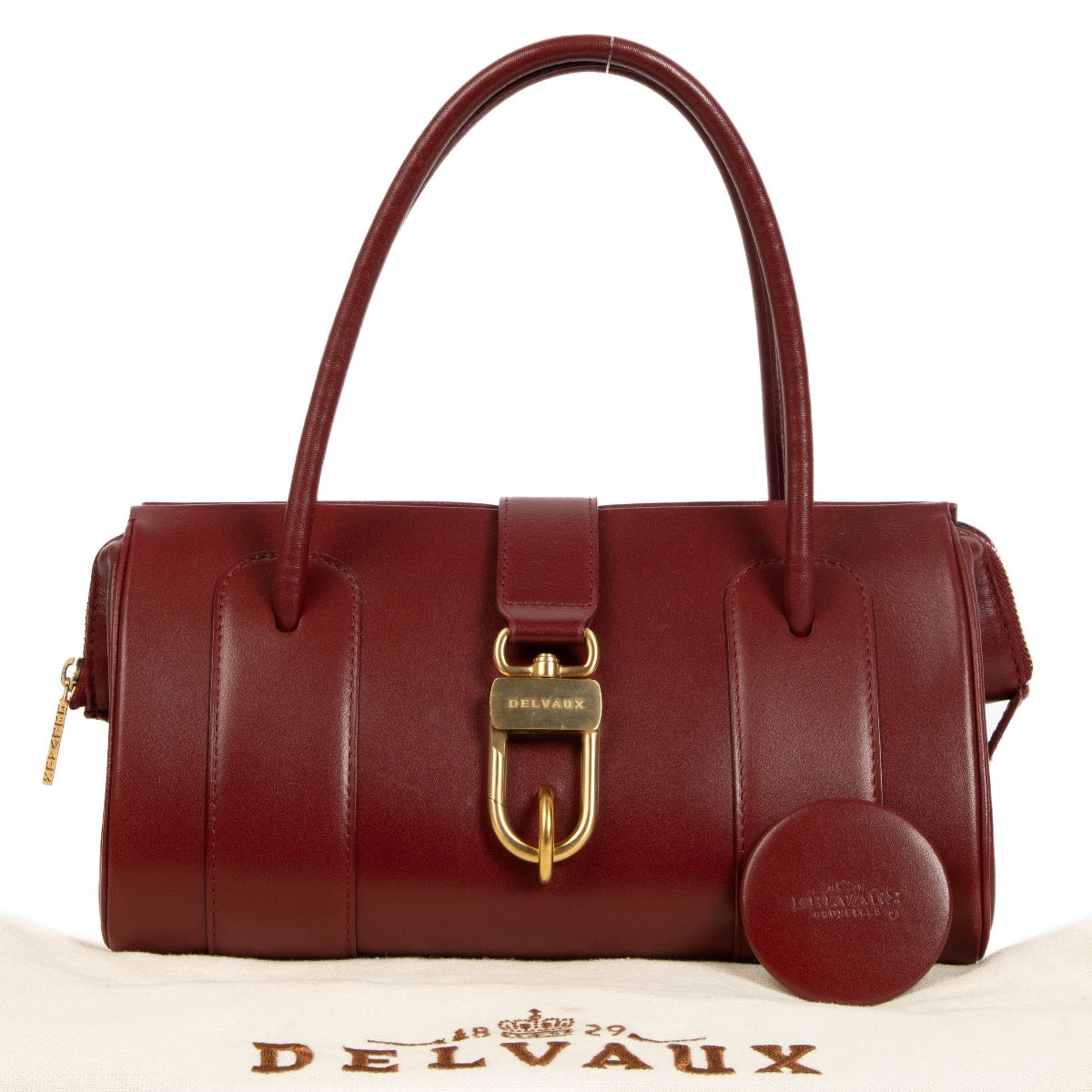 shop 100% authentic second hand Delvaux Le Georges PM Jumping Lisse Burgundy Bag on Labellov.com