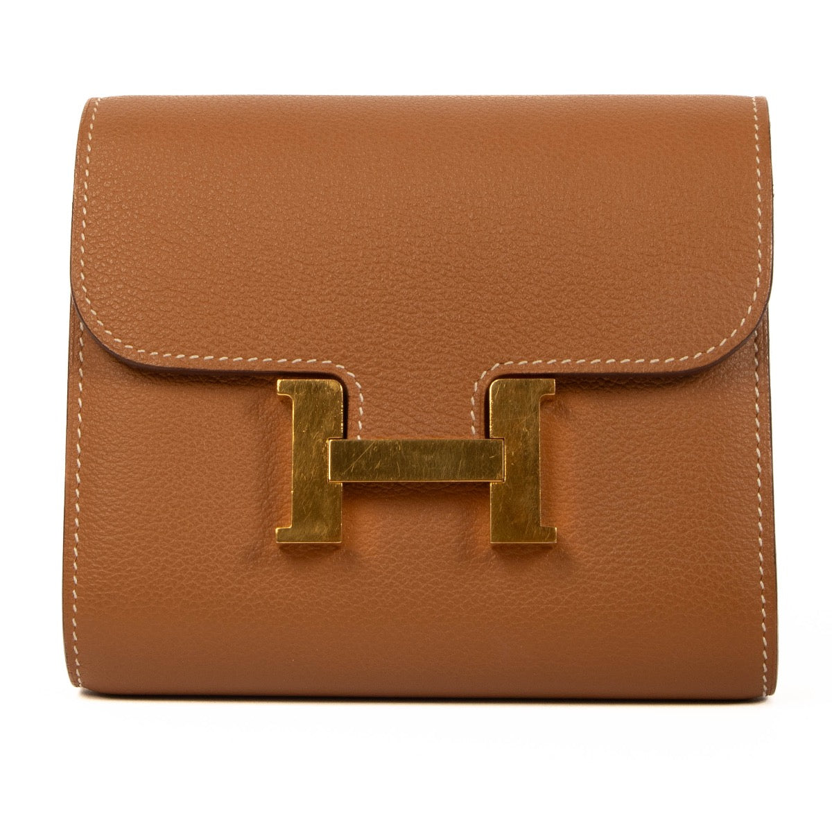 Shop safe online at Labellov in Antwerp, Brussels and Knokke this 100% authentic second hand Hermès Gold Evercolor Compact Constance Wallet