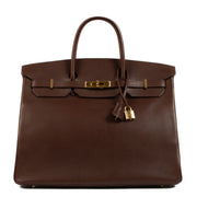 Indulge in opulence with our preloved Hermès Birkin 40 Havane Evergrain GHW - a fashion statement that transcends trends.