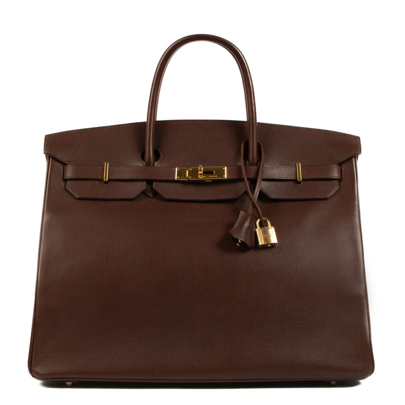 Indulge in opulence with our preloved Hermès Birkin 40 Havane Evergrain GHW - a fashion statement that transcends trends.
