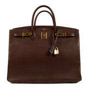 Experience luxury redefined with our preloved Hermès Birkin 40 Havane Evergrain GHW - a true investment in timeless fashion