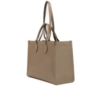 Shop safe online at Labellov in Antwerp, Brussels and Knokke this 100% authentic second hand Louis Vuitton Dune Monogram Empreinte Onthego MM Tote Bag