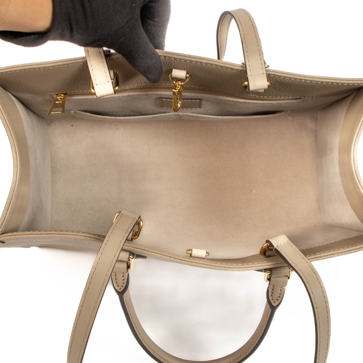 Shop safe online at Labellov in Antwerp, Brussels and Knokke this 100% authentic second hand Louis Vuitton Dune Monogram Empreinte Onthego MM Tote Bag