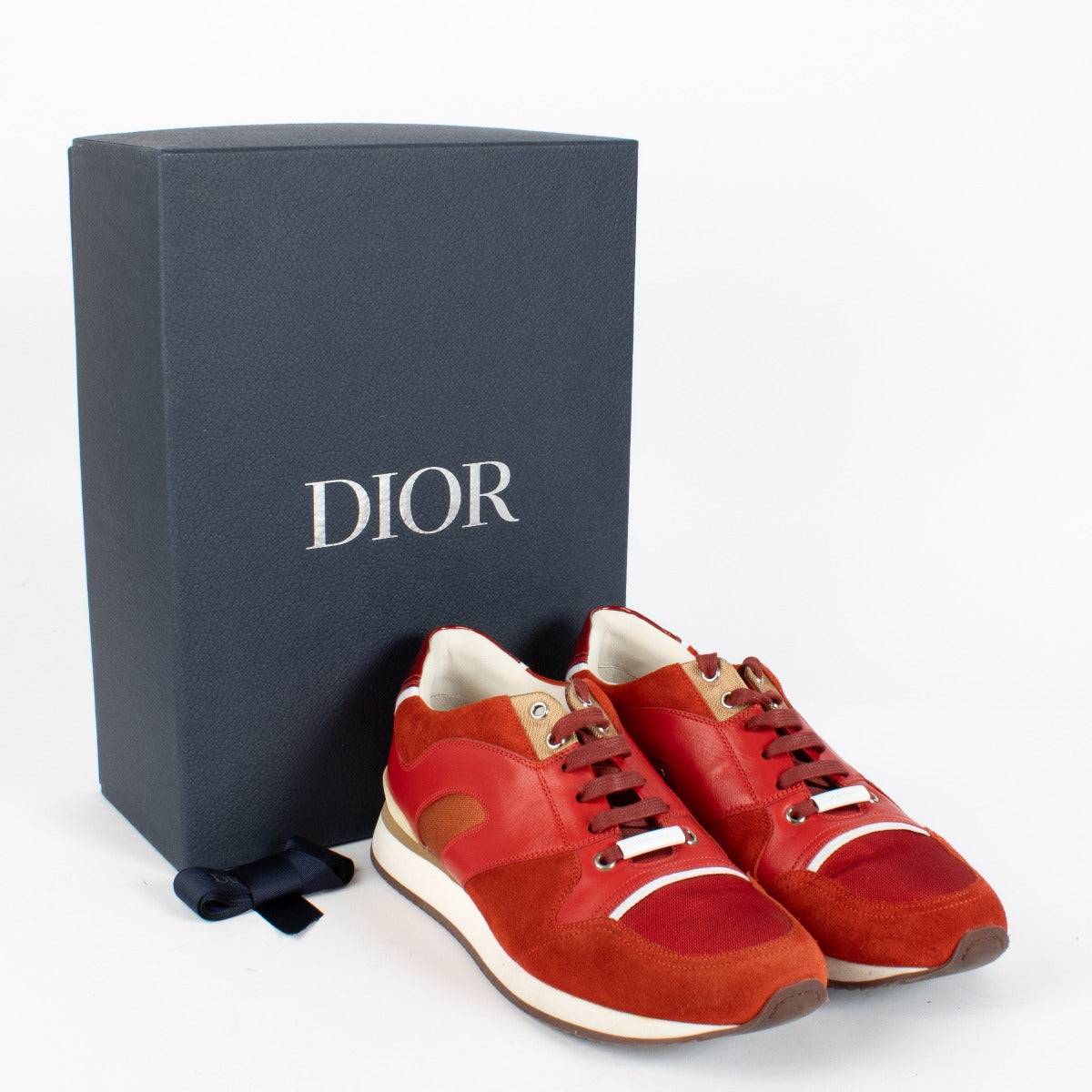 Authentic pre-loved Dior Homme Red Sneakers — Size 42 on Labellov.com