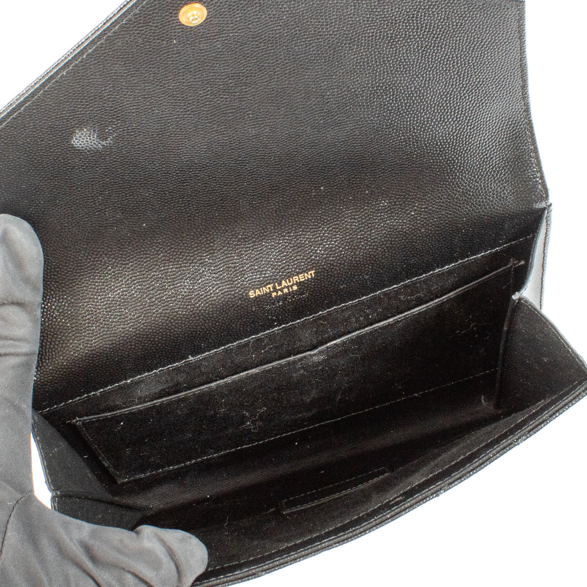 Pochette Saint Laurent noire en cuir grainé Cassandre