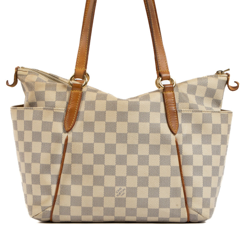 Louis Vuitton Damier Azur Totally MM Shoulder Bag for the best price at Labellov secondhand luxury in Antwerp. We buy and sell your preloved designer bags for the best price.