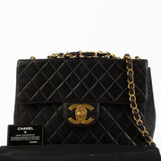 Shop Chanel Black Vintage 31 Classic Flap Bag on Labellov.com