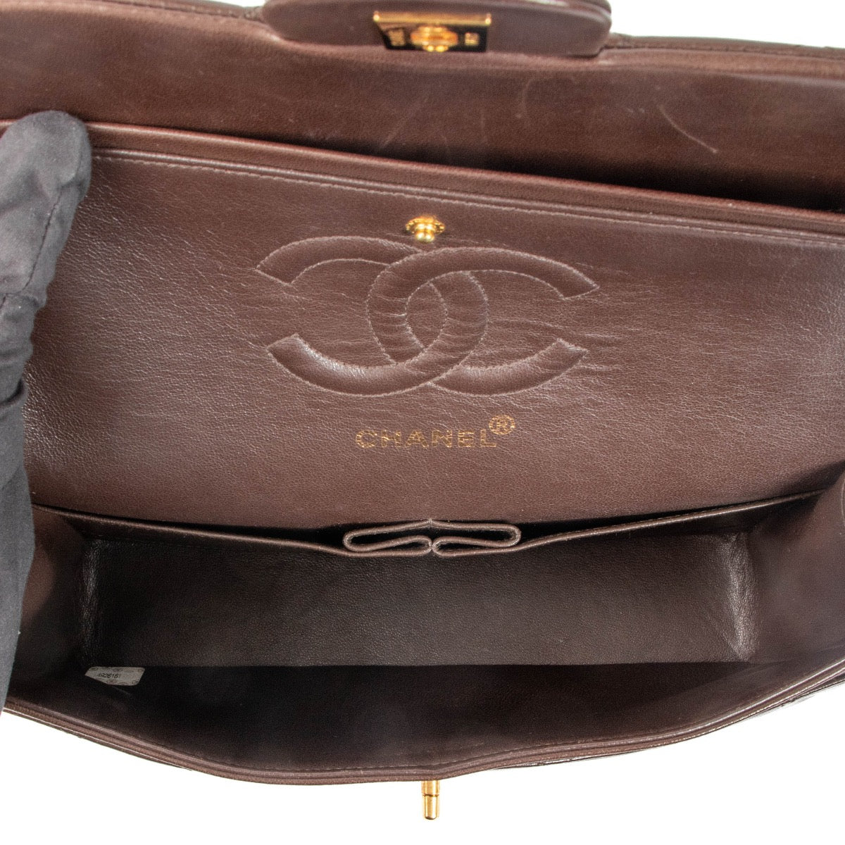 Shop safe online at Labellov in Antwerp, Brussels and Knokke this 100% authentic second hand Chanel Brown Lambskin Medium Classic Flap Bag