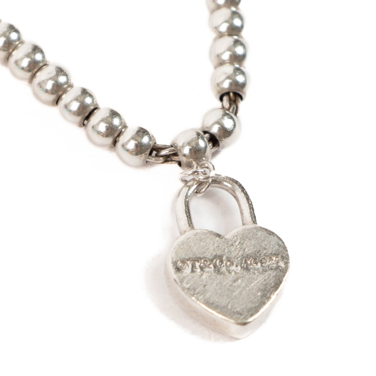 Bracelet Tiffany & Co. en argent sterling « Return to Tiffany » avec breloque cœur et cadenas