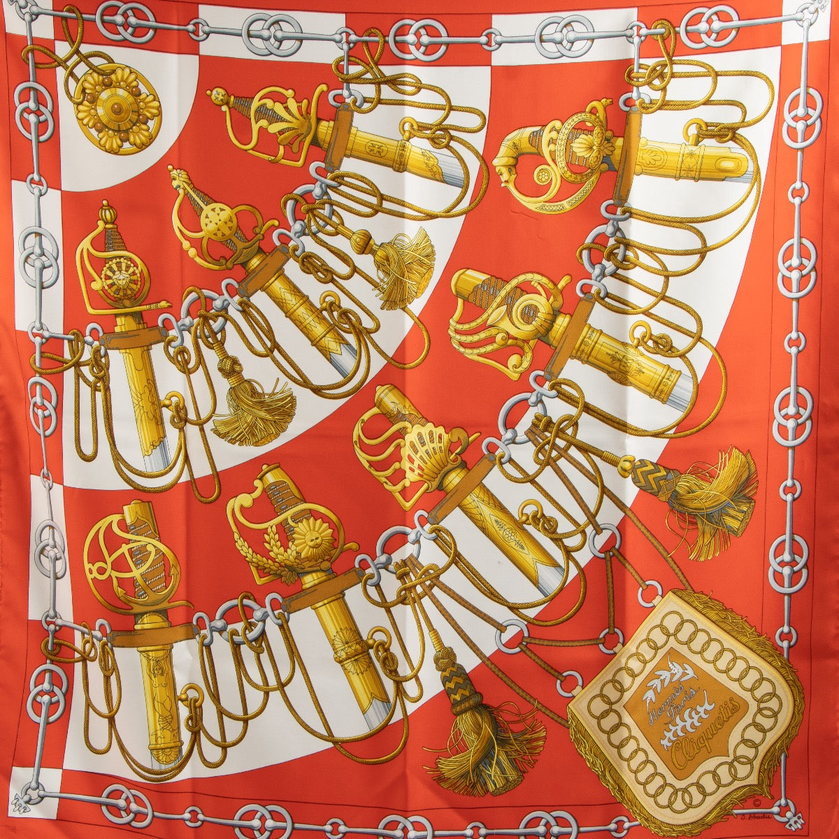 Shop 100% authentic second-hand Hermès Orange Cliquetis Silk Scarf on Labellov.com