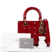 Shop safe online at Labellov in Antwerp, Brussels and Knokke this 100% authentic second hand Christian Dior Cherry Patent Leather Medium Lady Dior Bag