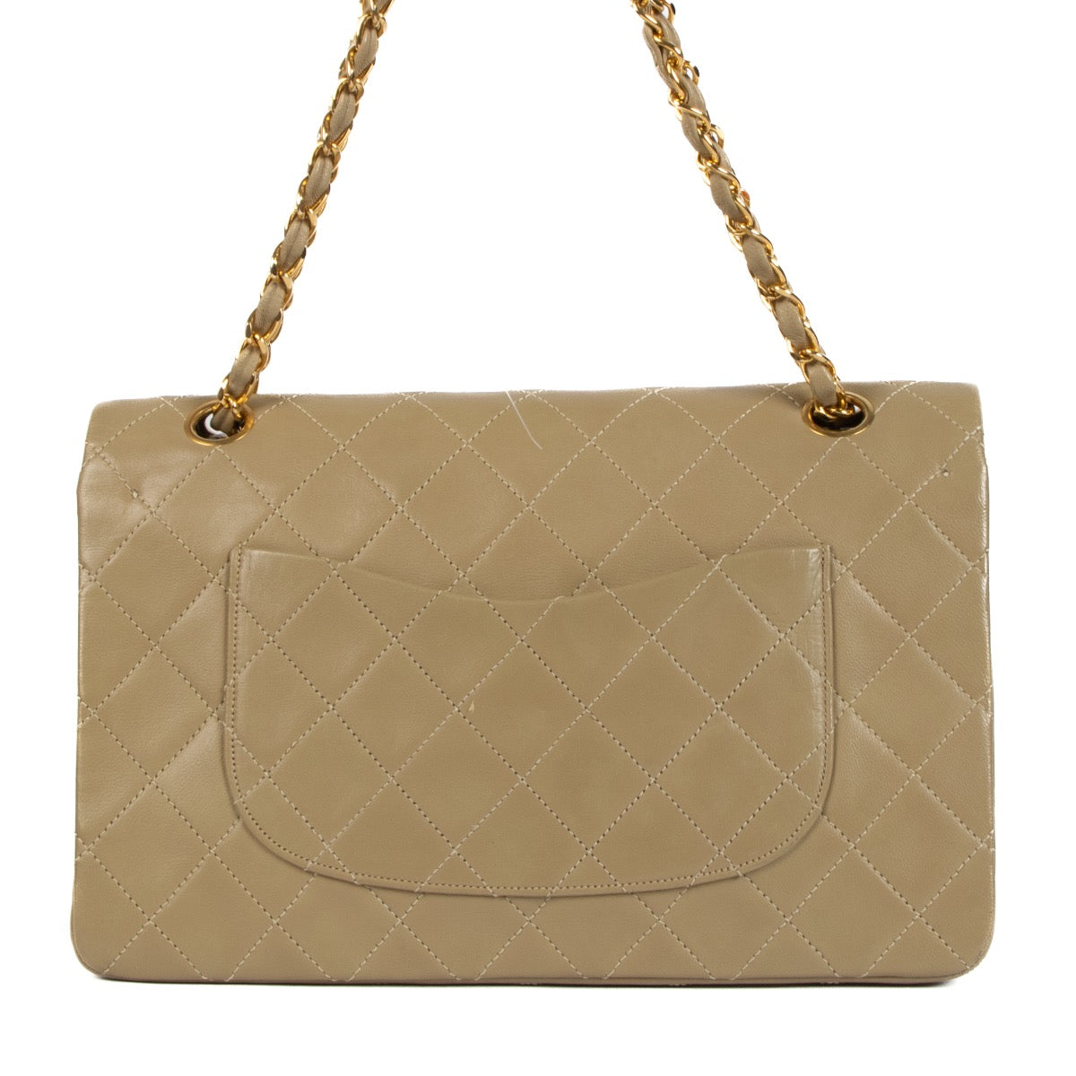 Shop safe online at Labellov in Antwerp, Brussels and Knokke this 100% authentic second hand Chanel Beige Lambskin Medium Classic Flap Bag