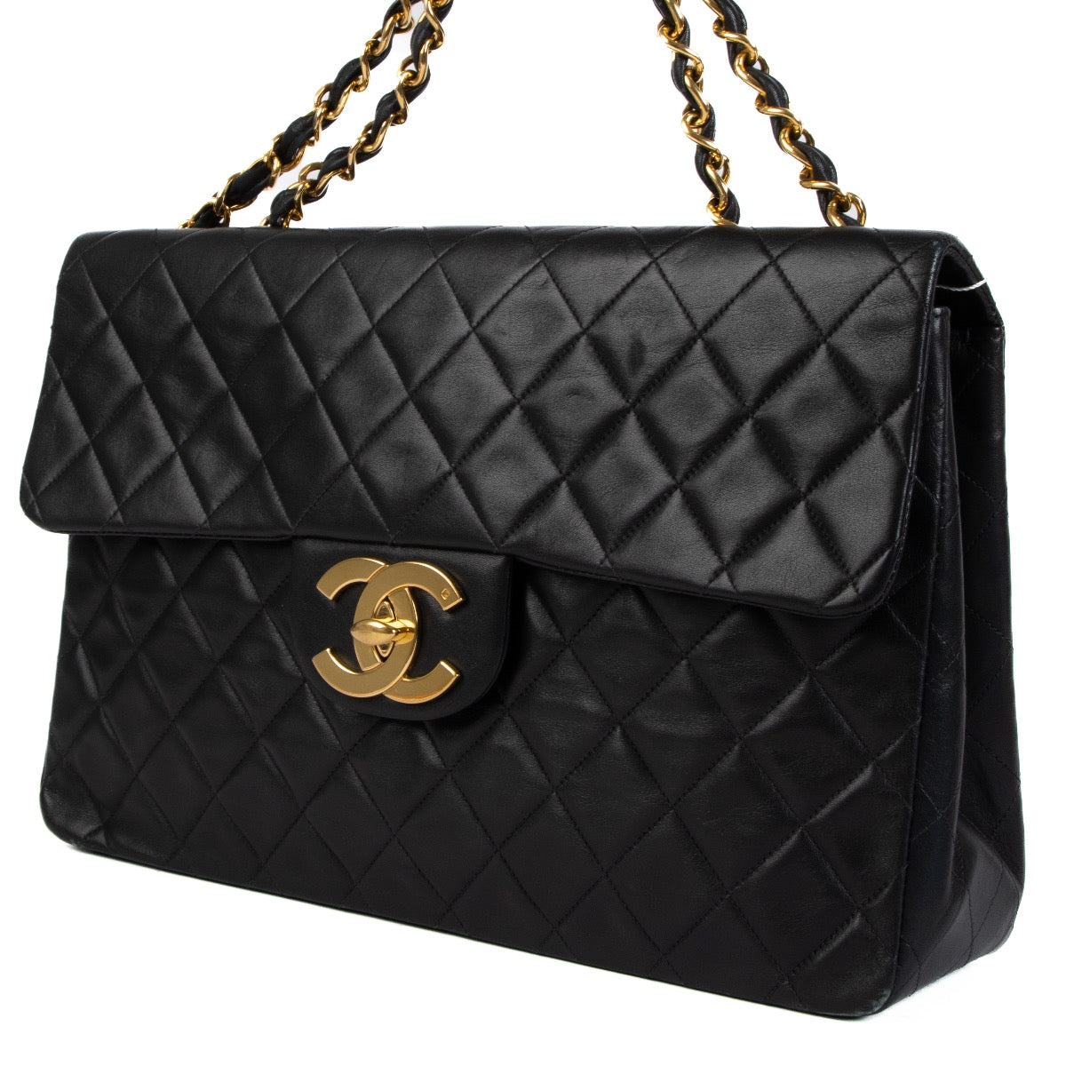 Shop safe online at Labellov in Antwerp, Brussels and Knokke this 100% authentic second hand Chanel Vintage Black Lambskin Maxi Classic Flap Bag