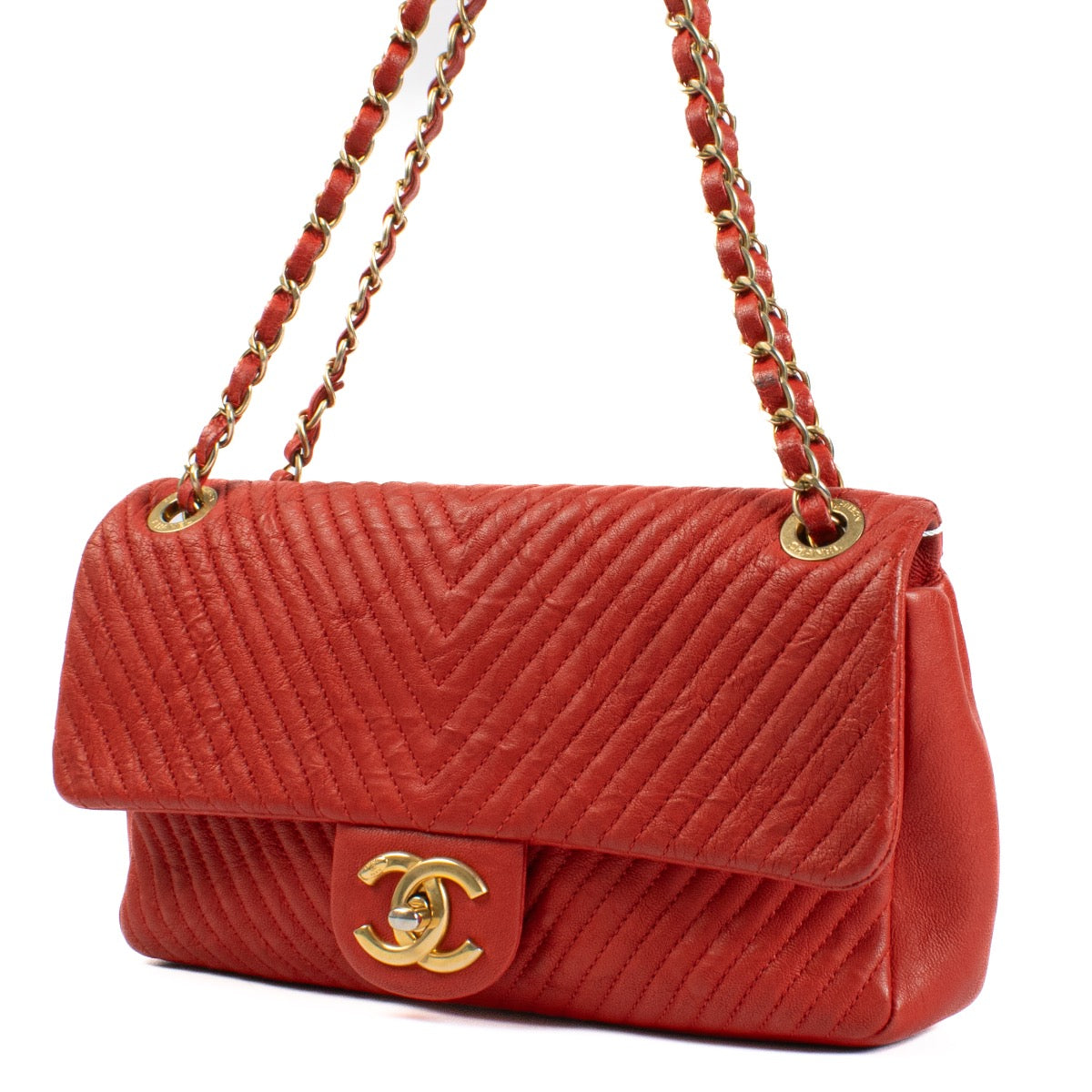 shop 100% authentic second hand Chanel Red Chevron Wrinkled Goatskin Medallion Flap Bag on Labellov.com