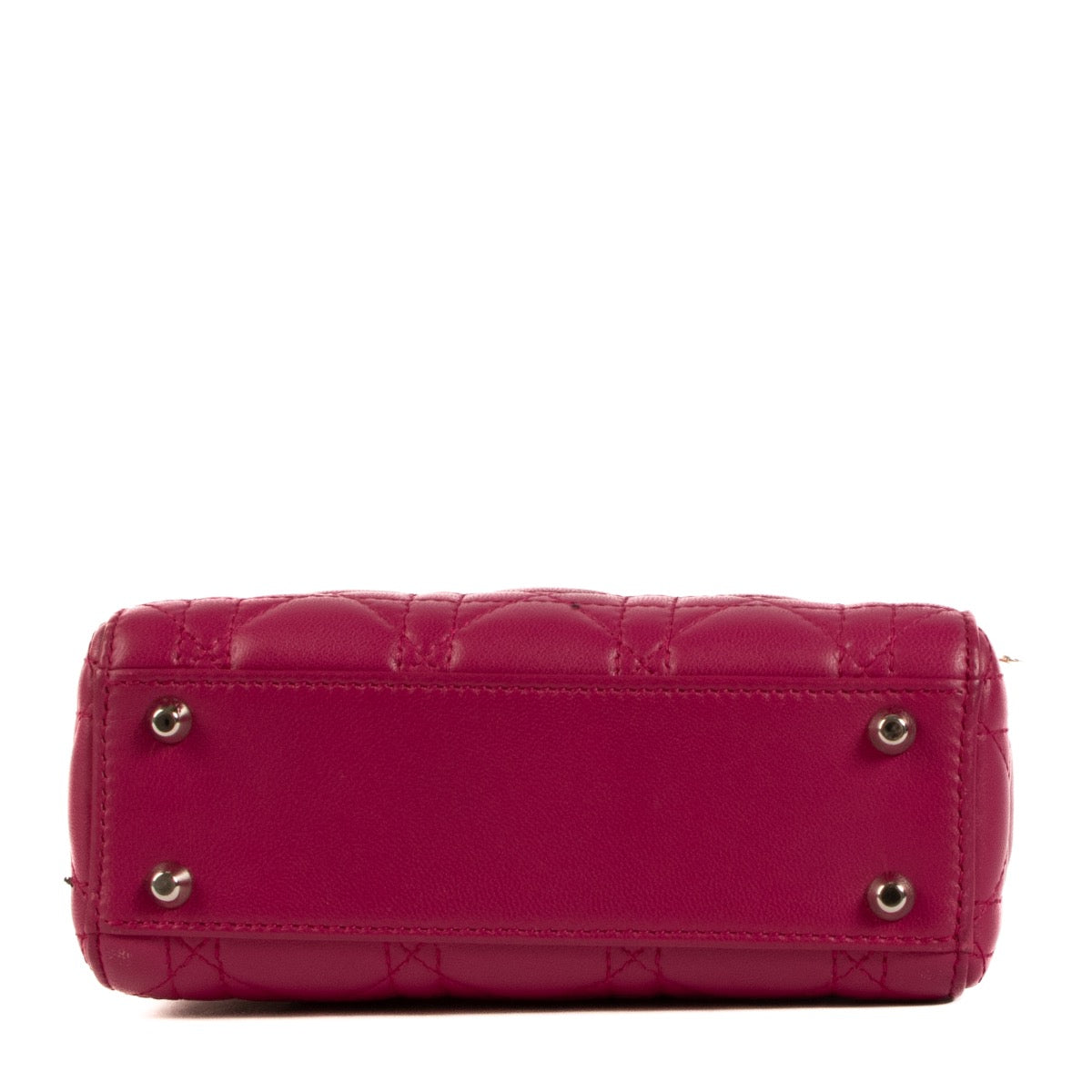 Shop safe online at Labellov in Antwerp, Brussels and Knokke this 100% authentic second hand Christian Dior Fushia Lambskin Mini Lady Dior