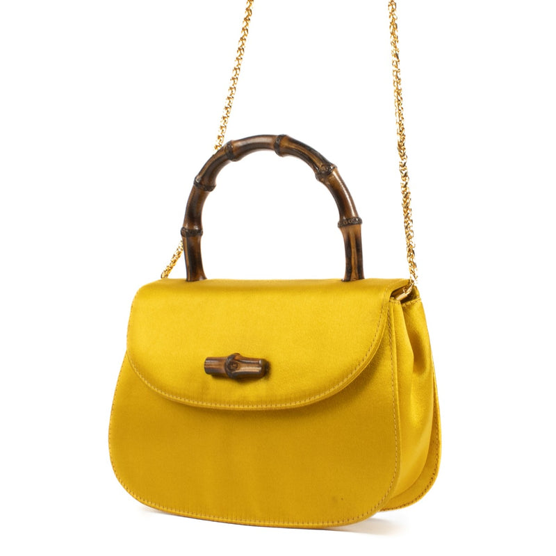 Shop safe online at Labellov in Antwerp, Brussels and Knokke this 100% authentic second hand gucci Yellow Satin Bamboo night satchel Top Handle Bag