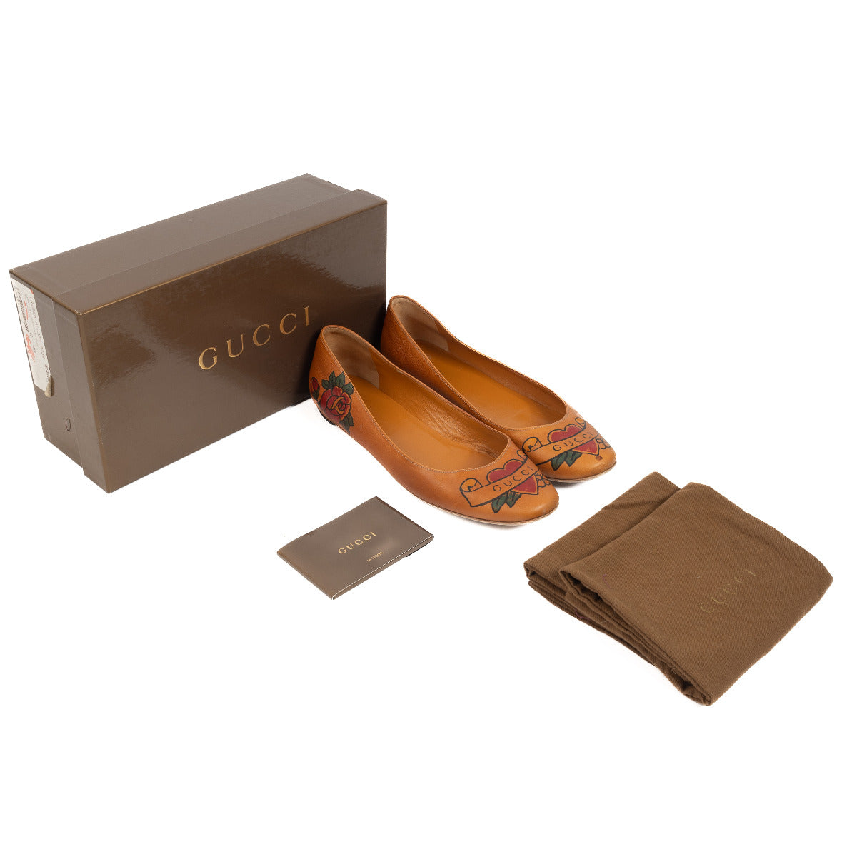 Gucci Cognac Tattoo Print Flats - size 40 fo the best price at Labellov secondhand luxury in Antwerp.