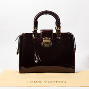 Louis Vuitton Amarant Vernis Melrose Avenue GM for the best price at Labellov secondhand luxury in Antwerp. We buy and sell your preloved and brand new designer bags for the best price.