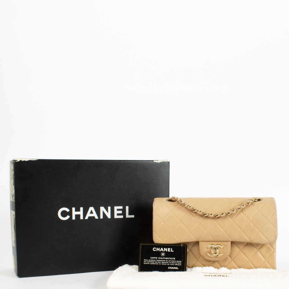 Authentic Preloved Chanel Beige Small Classic Handbag Classic Flap Bag Year: 2002-2003 on Labellov.com