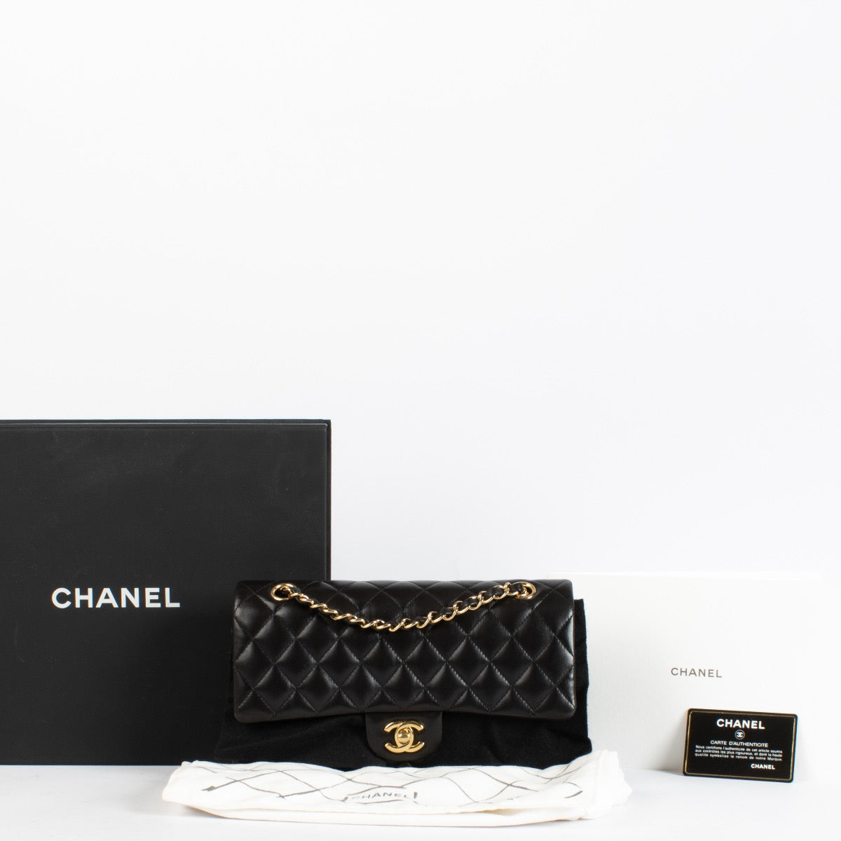 authentic preloved Chanel Black Medium Classic 11.12 Handbag on Labellov.com