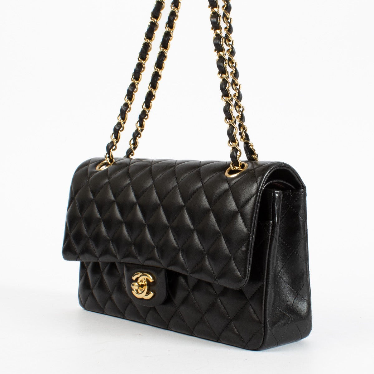 authentic preloved Chanel Black Medium Classic 11.12 Handbag on Labellov.com