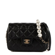 shop 100% authentic second hand Chanel Black Lambskin Logo Pearl Flap Bag on Labellov.com