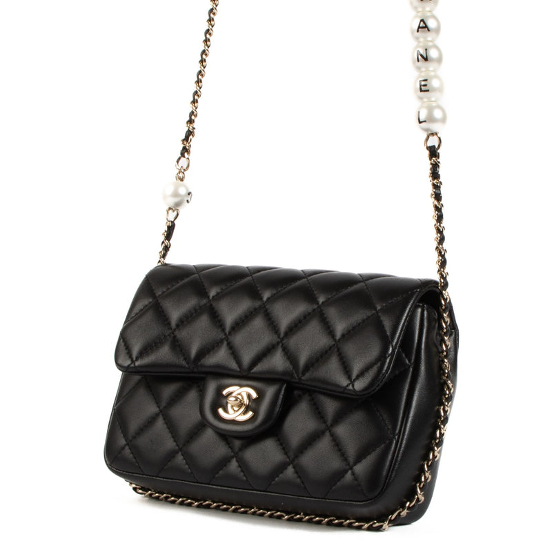 shop 100% authentic second hand Chanel Black Lambskin Logo Pearl Flap Bag on Labellov.com