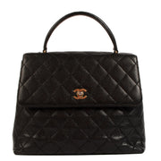 Shop safe online at Labellov in Antwerp, Brussels and Knokke this 100% authentic second hand Chanel Black Caviar Leather Vintage Coco Top Handle