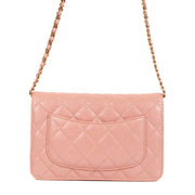 Shop safe online at Labellov in Antwerp, Brussels and Knokke this 100% authentic second hand Chanel Pink Iridescent Caviar Leather Wallet On Chain