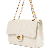 shop 100% authentic second hand Chanel Vintage White Lambskin Medium Classic Flap Bag on Labellov.com
