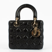 Christian Dior Small Lady Dior Bag in black lambskin with gold hardware and red interior, full set with care booklet and receipt at Labellov.com