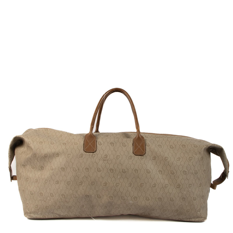 Buy an authentic second hand Christian Dior Beige Canvas Monogram Boston Bag Bag in pre loved condition at Labellov Antwerp.