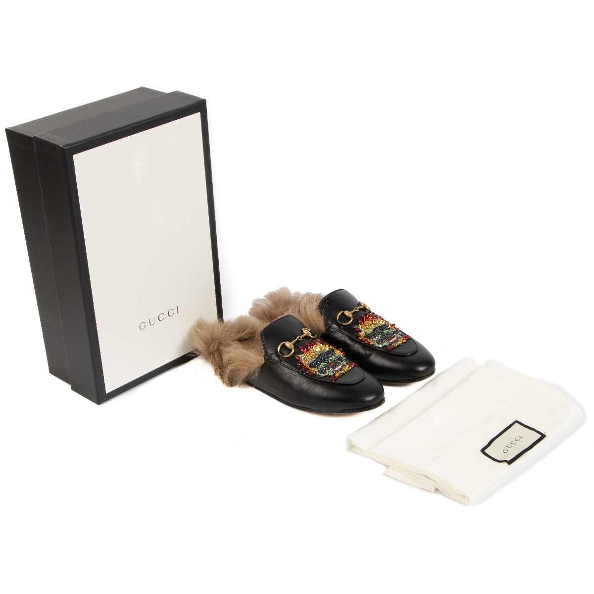 Shop safe online at Labellov in Antwerp, Brussels and Knokke these 100% authentic second hand Gucci Black Leather Princetown Fur Loafers - size 37