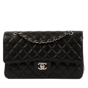 Chanel Black Caviar Leather Medium Classic Flap Bag PHW for the best price at Labellov secondhand luxury in Antwerp. We buy and sell your preloved designer bags.