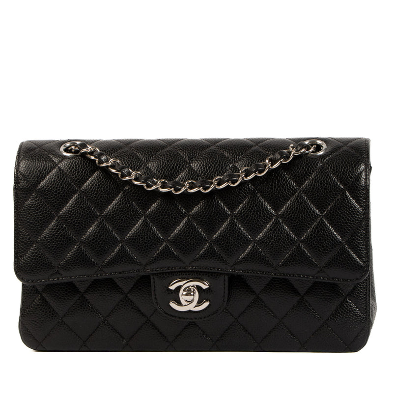 Chanel Black Caviar Leather Medium Classic Flap Bag PHW for the best price at Labellov secondhand luxury in Antwerp. We buy and sell your preloved designer bags.