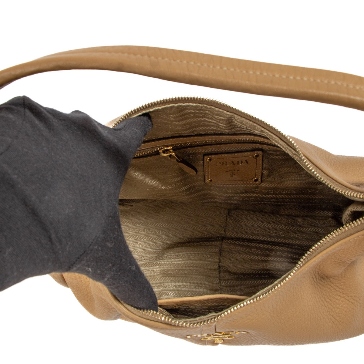 Shop safe online at Labellov in Antwerp, Brussels and Knokke this 100% authentic second hand Prada Beige Daino Leather Shoulder Bag
