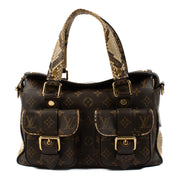 Elevate your style with the Louis Vuitton Monogram/Python Manhattan NM, a luxurious blend of sophistication and exotic flair. This exquisite handbag combines the brand's iconic Monogram canvas with premium python leather, showcasing a unique interplay of