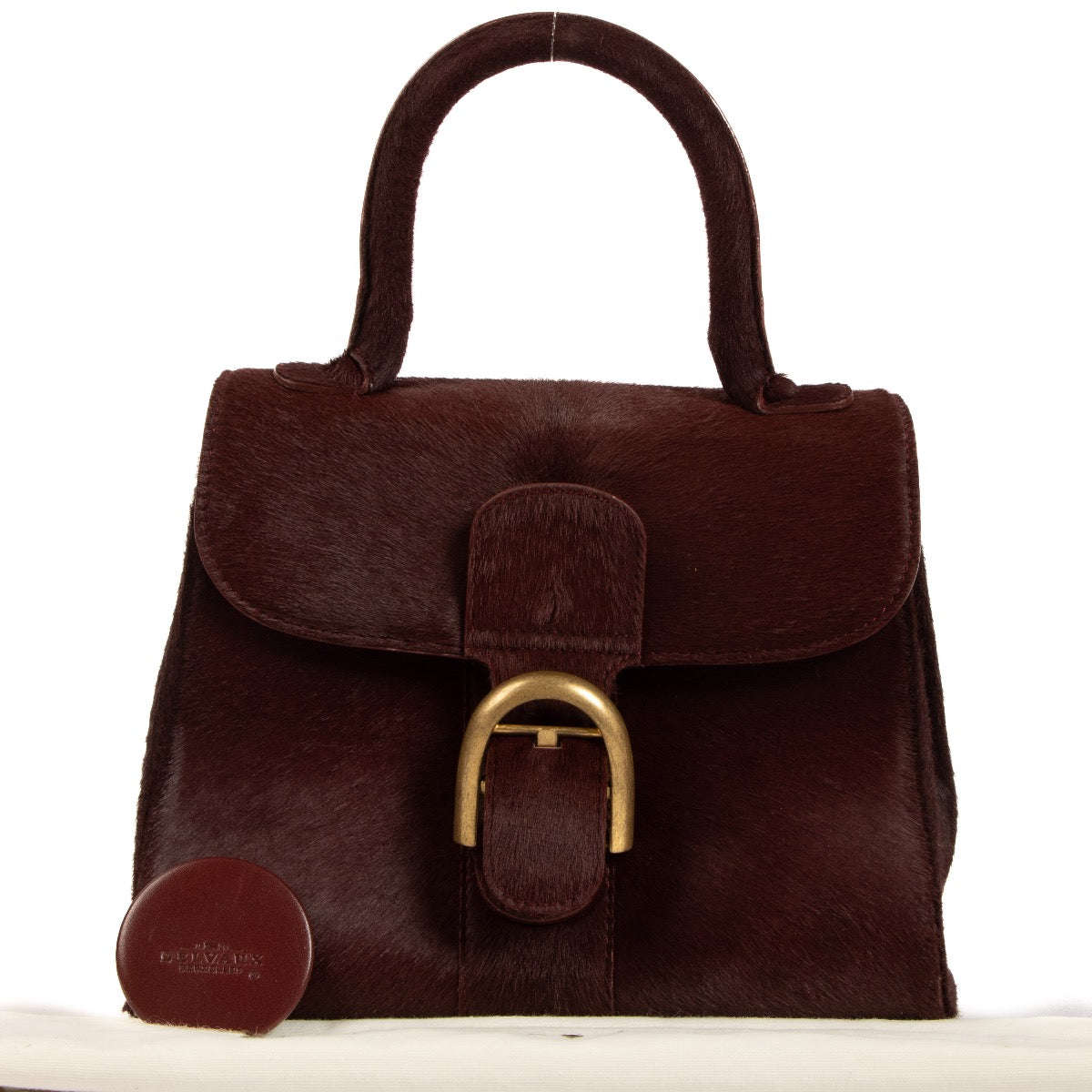 Shop safe online at Labellov in Antwerp, Brussels and Knokke this 100% authentic second hand Delvaux Burgundy Pony Hair Brillant PM