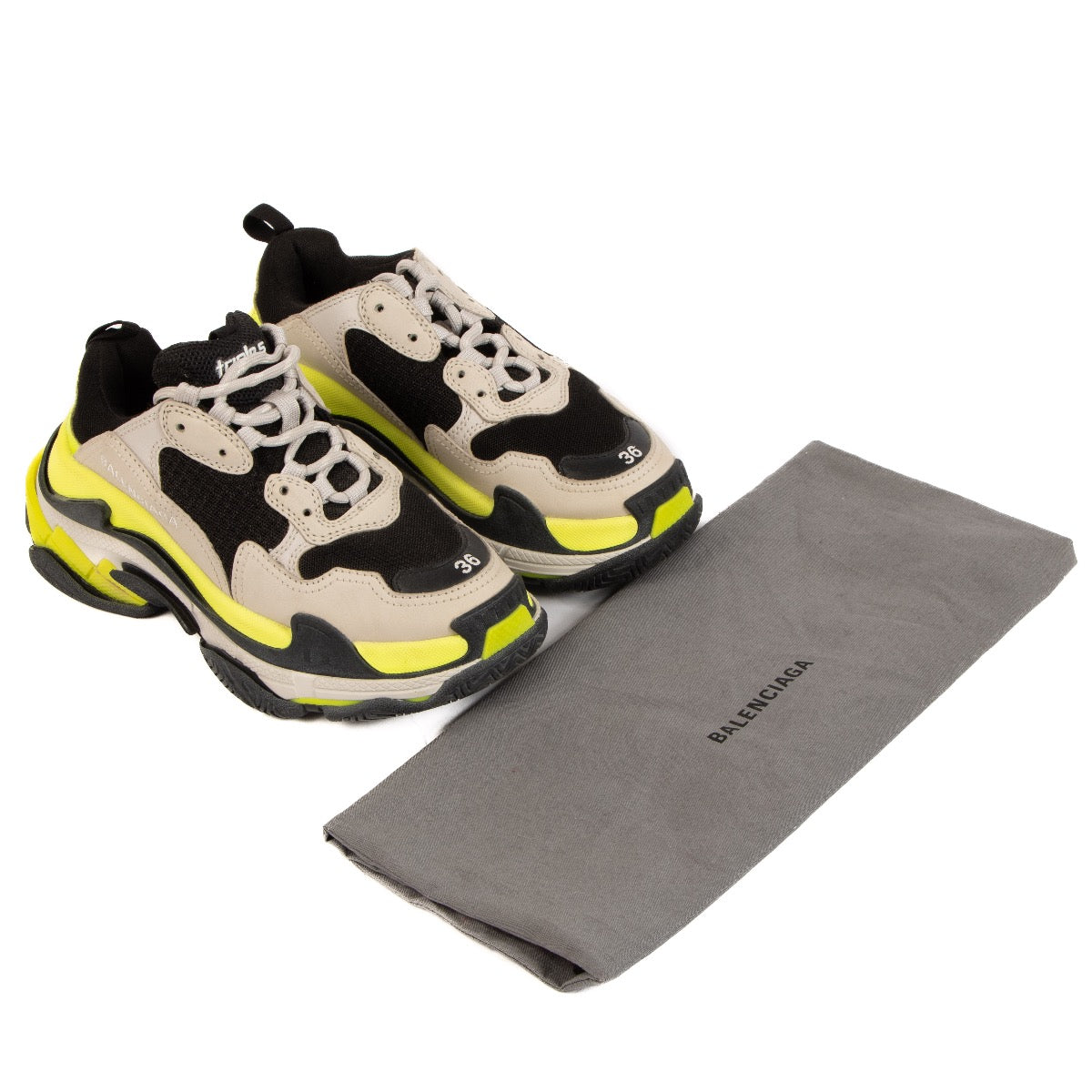 Shop safe online at Labellov these 100% authentic second hand Balenciaga Black, Yellow and Beige Triple S Sneakers - size 36