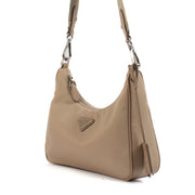Shop safe online at Labellov in Antwerp, Brussels and Knokke this 100% authentic second hand Prada Re-Edition 2005 Beige Re-Nylon Crossbody Bag