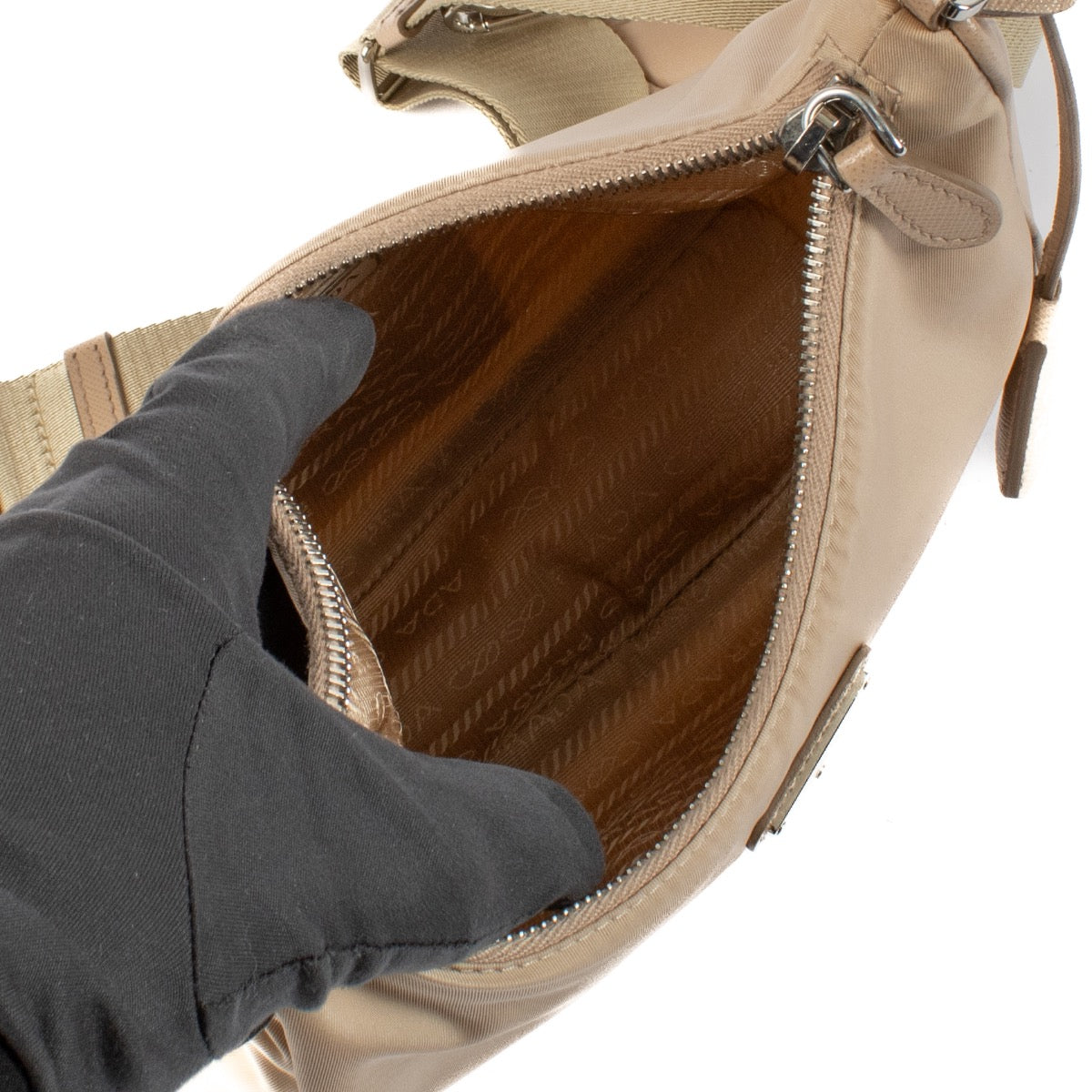 Shop safe online at Labellov in Antwerp, Brussels and Knokke this 100% authentic second hand Prada Re-Edition 2005 Beige Re-Nylon Crossbody Bag