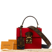 Louis Vuitton Red Patent Navy Epi Monogram Spring Street Bag for the best price at Labellov secondhand luxury in Antwerp. BUy and sell your authentic designer bags for the best price.